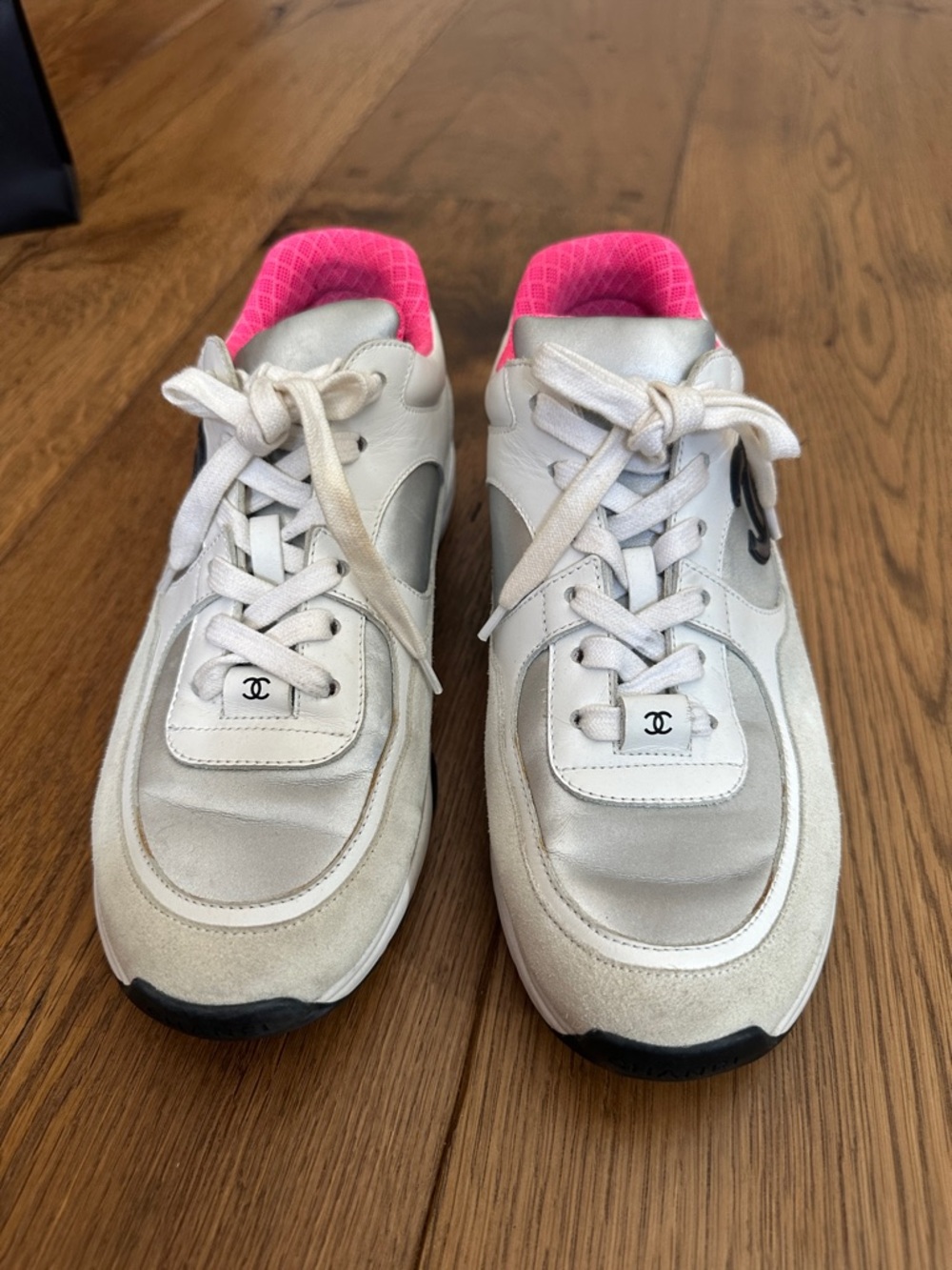 CHANEL White Sneakers with Pink Quilted Collar